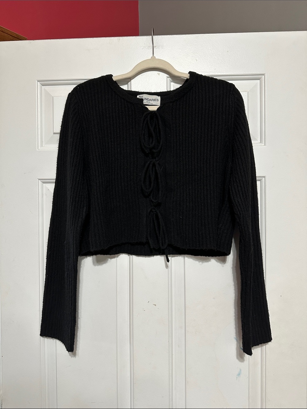 No Boundaries tie front sweater